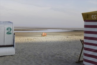 Two deckchairs on the beach of Borkum, 21.07.2024