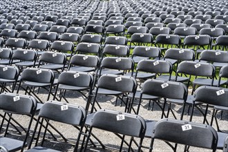 Chairs marked with numbers, rows of seats, rows of chairs at a music festival, Salem Castle, former