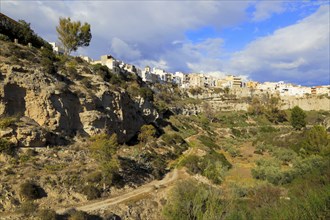 Buildings perched on edge of clifftop, Sorbas, Almeria, Spain, Europe