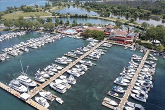 Detroit, Michigan, An aerial view of the Detroit Yacht Club on Belle Isle in the Detroit River. The