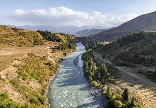 Mountain landscape with river in a narrow mountain valley in autumn, Little Naryn or Kichi-Naryn,