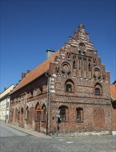 Medieval brick house with stepped gable in the old town of Ystad, Skåne County, Sweden,