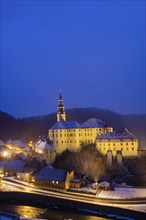 Winter evening in the Müglitz valley, impressively illuminated Weesenstein Castle at the blue hour,