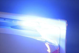 Close-up of a blue light on an ambulance at night (Berlin)