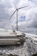 Demolished tower of a 20 year old wind turbine, in the Werl wind farm, 5 old Enercon E-66 turbines