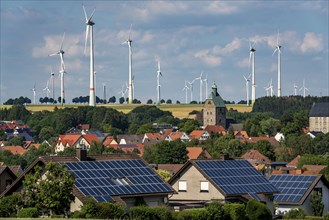 Wind farm near the East Westphalian town of Energiestadt Lichtenau, many residential buildings with