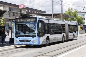 Mercedes-Benz Citaro public transport bus at the main railway station stop in Ulm, Germany, Europe