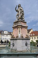 Market fountain on the market square with the statue of Duke Eberhard Ludwig, founder of the city