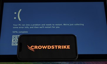 Illustration of a critical error in CrowdStrike software update caused a blue screen of death on