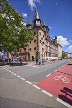 Saalhof with Rententurm at the Mainkai under a blue sky with cumulus clouds in Frankfurt am Main,