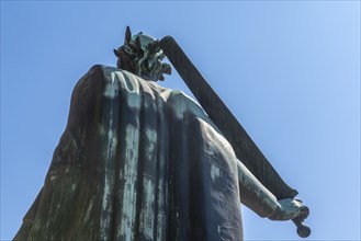 Odense, King Knud statue, crown, sword, tower of the cathedral church, Fyn, island of Funen,