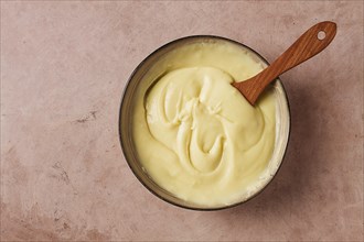 Mashed potatoes, homemade, on a beige table, no people, top view