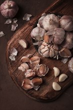 Fresh garlic, on a dark background, top view, food concept