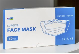 Box containing surgical face masks, England, UK TopGene brand