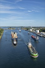 Cargo ships waiting in front of the lock, Kiel Canal, Holtenau, Kiel, Schleswig-Holstein, Germany,