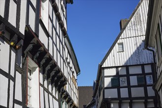 Half-timbered house against a cloudless blue sky in the old town centre of Hattingen, Ennepe-Ruhr