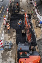 Road being tarred after earthworks, North Rhine-Westphalia, Germany, Europe