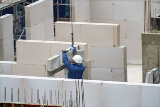 Construction site, new construction of apartment blocks, shell construction, North