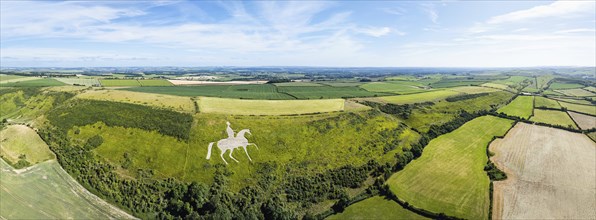 Panorama of Fields and farms over Osmington White Horse from a drone, Osmington Hill, Weymouth,