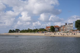 People doing early morning sports on the beach, North Sea coast, Wyk, Föhr, North Sea island, North