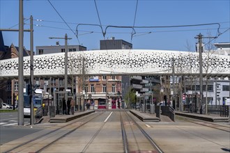 The Parkbruk, a cycle and pedestrian bridge in the centre of Antwerp, crosses a multi-lane city