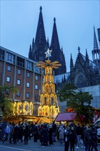 Christmas market at Roncalli Platz am Dom, in the city centre of Cologne, Sunday shopping in