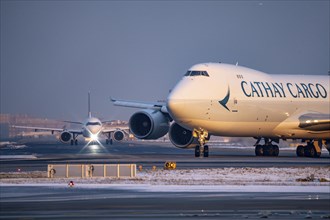 Aircraft on the taxiway to the western runway, Cathay Pacific Boeing 747F, freighter, Frankfurt