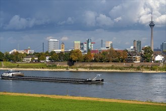 The skyline of Düsseldorf, with the skyscrapers in the Media Harbour, Rhine bridges, Rhine Tower,