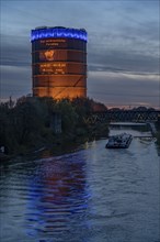 Neue Mitte Oberhausen, Gasometer exhibition hall, after renovation, Rhine-Herne Canal, evening