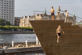 Summer, swimming in the harbour of Copenhagen, there are official bathing places, harbour baths and