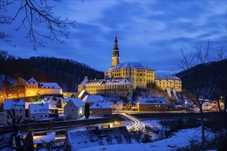 Winter evening in the Müglitz valley, impressively illuminated Weesenstein Castle at the blue hour,