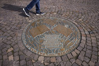 Pedestrian, memorial plaque, commemorating the burning of books by the National Socialists,