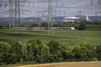 Railway line between Essen and Bochum near Wattenscheid, RRX Rhine-Ruhr Express, regional train,