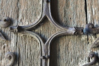 Orcival. Intricate Roman wrought iron hinge displayed at the Basilica Notre-Dame d'Orcival, Puy de