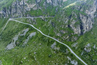 Mountain road up to Lac de Moiry, mountain lake and dam, final curves, Valais, Switzerland, Europe