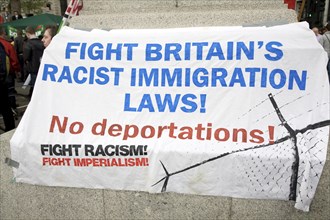 May Day march and rally at Trafalgar Square, London, England, UK May 1st, 2010 Immigration banner