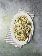 Fettuccine with champignons, basil, in cream sauce, homemade, no people