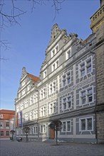 Renaissance building with sgraffiti and flags, EU flag, German state flag, Bavarian state flag,