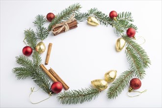 Christmas or New Year wreath composition. Decorations, balls, fir and spruce branches, on white