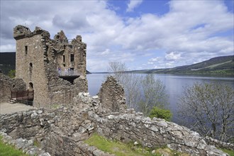 The ruins of Urquhart Castle beside Loch Ness near Drumnadrochit, Scotland, UK