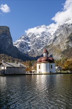 Königssee with Watzmann massif and pilgrimage church St. Bartholomä, autumnal mountain landscape,