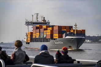 Trip with the Hadag harbour ferry on the Elbe, shortly in front of Finkenwerder, feeder ship