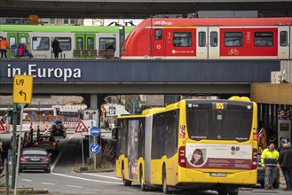 Local transport, junction at the main railway station, local trains, city bus, in the city centre