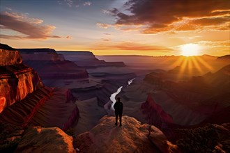 Sunrise over grand canyon in vibrant colors casting light on overhanging rock formations, AI