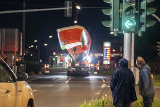 Transport of a 68 metre long, 22 tonne blade of a wind turbine, here in Schwelm, with a