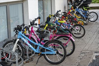 Children's bicycles in front of a day care centre