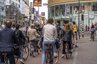 Central cycle path on Lange Viestraat, in the city centre of Utrecht, lanes for pedestrians,