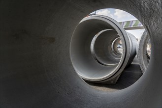 Concrete sewer pipes, stored on a construction site during sewer renovation work, on the Dickswall,