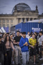 Scenes in the fan zone on Platz der Republik in front of the Reichstag building taken in Berlin, 29