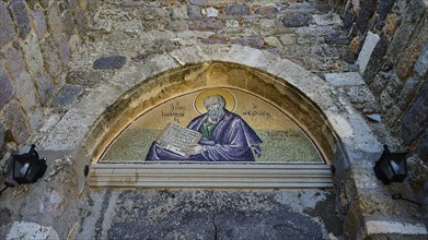 Medieval mosaic above an archway in a historic stone structure, Agiou Theologou Monastery, St